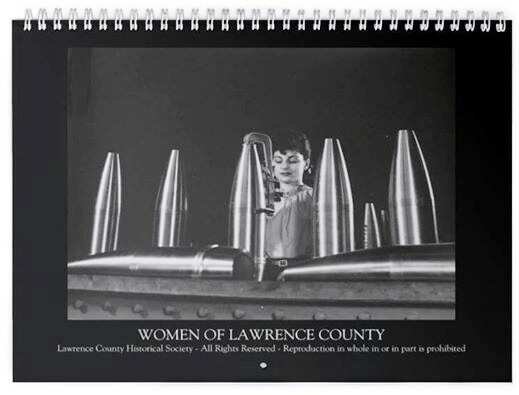 2015 calendar featuring women of Lawrence County working in factories etc during World War II.