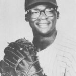 photo of dick allen in philadelphia phillies baseball uniform wearing baseball glove