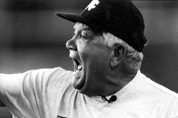 Photo of Lindy Lauro wearing cap and yelling.