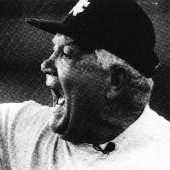 lindylauro_crop21.jpg lindy lauro wearing baseball cap and yelling to someone