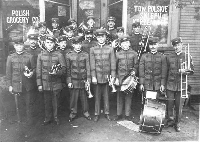 Members of band in full uniform.