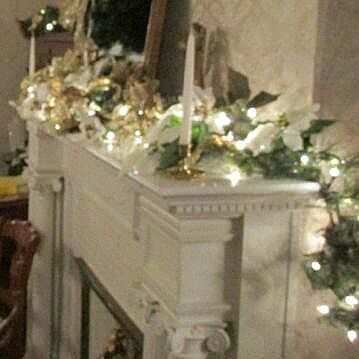 Fireplace mantel decorated Victorian holiday style at the Lawrence County Historical Society in Pennsylvania.